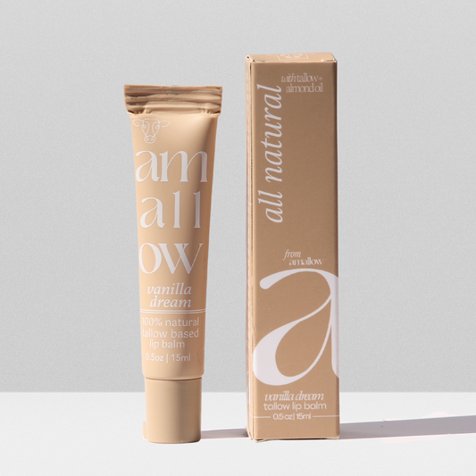 Tube shown next to box. Box reads all natural vanilla dream tallow lip balm with tallow + almond oil from amallow. .5 oz 15 ML