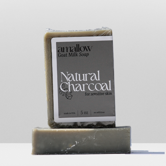 Natural Charcoal  soap shown. Label Reads "Amallow Goat Milk Soap. Natural Charcoal for sensitive skin. Made in USA 5 oz, no additives.