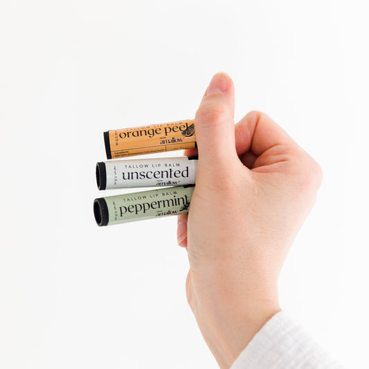 3 Amallow Lip Balms Held In a hand