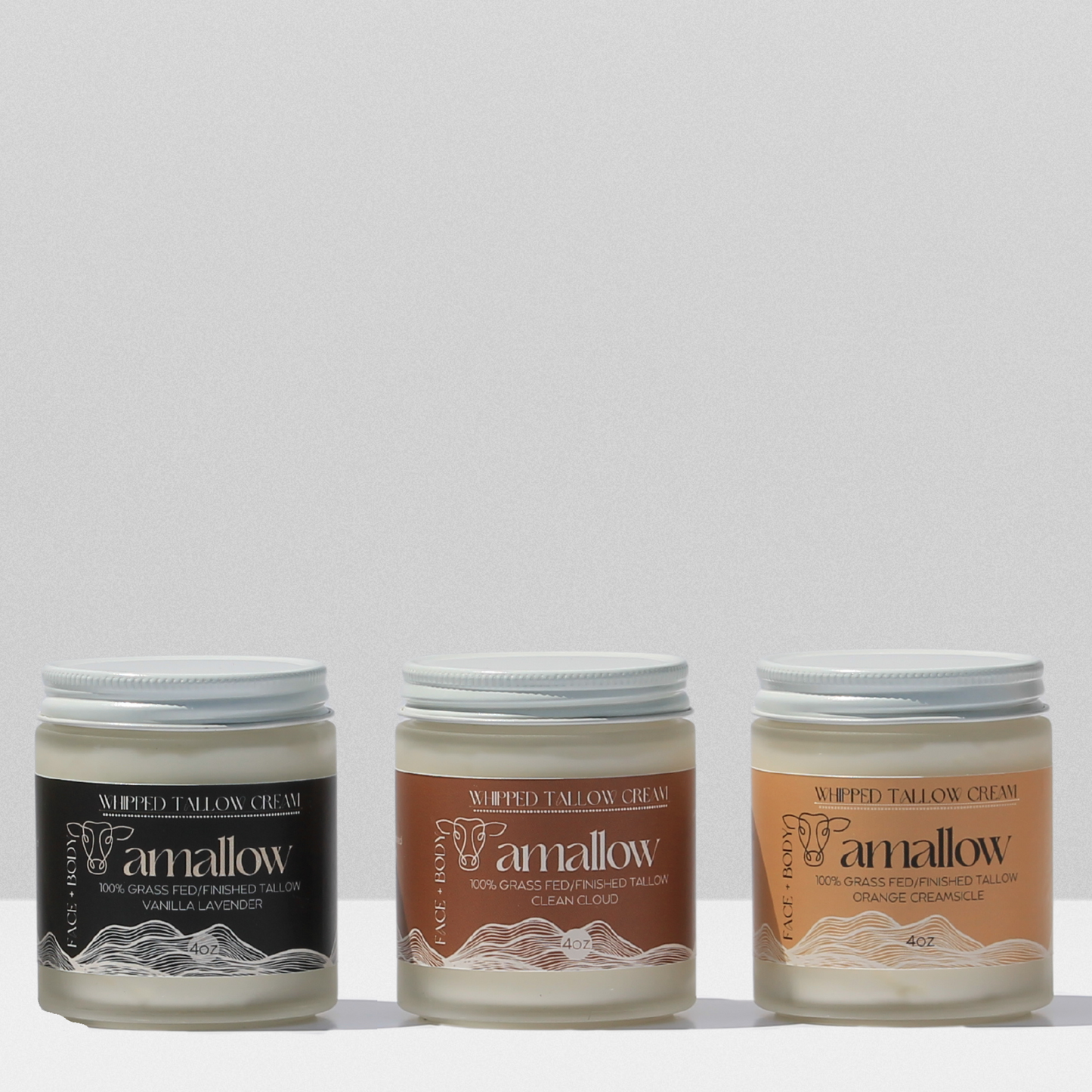 Bundle of Vanilla Lavender, Clean Cloud and Orange Creamsicle Products shown next to each other.