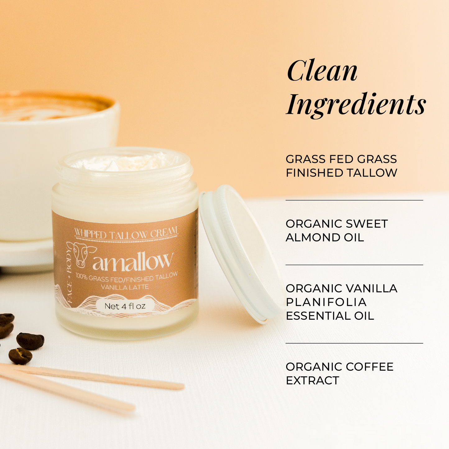 Clean Ingredients - Grass Fed Grass Finished Tallow Organic Sweet Almond Oil, Organic Vanilla Planifolia Essential Oil, Organic Coffee Extract. Jar of Vanilla latte shown next to latte and coffee beans.