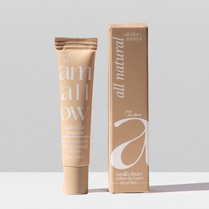 Tube shown next to box. Box reads all natural vanilla dream tallow lip balm with tallow + almond oil from amallow. .5 oz 15 ML