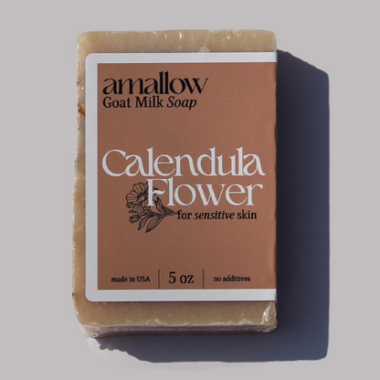 Up close picture of bar of calendula goat milk soap.