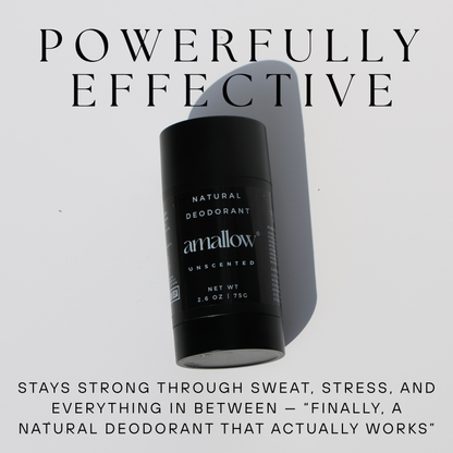 A black stick of Amallow Unscented Natural Deodorant is shown lying on a white surface, casting a shadow. The label reads: 'Natural Deodorant, Amallow, Unscented, Net Wt 2.6 oz | 75g'. Large text above the product says 'Powerfully Effective'. Below, smaller text reads: 'Stays strong through sweat, stress, and everything in between — “Finally, a natural deodorant that actually works."
